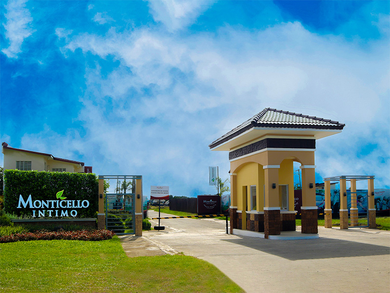 A model unit at Monticello Villas, Pavia, Iloilo, modern two-story architecture, stylish exterior finishes, and a comfortable family-oriented design.