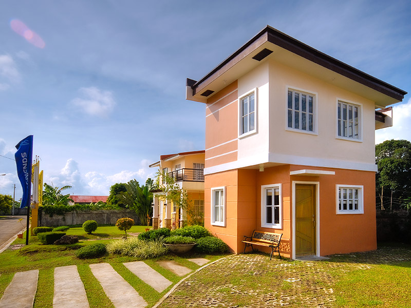 A model unit at Monticello Villas, Pavia, Iloilo, modern two-story architecture, stylish exterior finishes, and a comfortable family-oriented design.