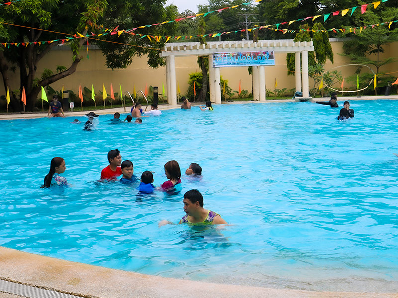 Homeowners of Parc Regency Residences in Pavia Iloilo dipping in the pool.