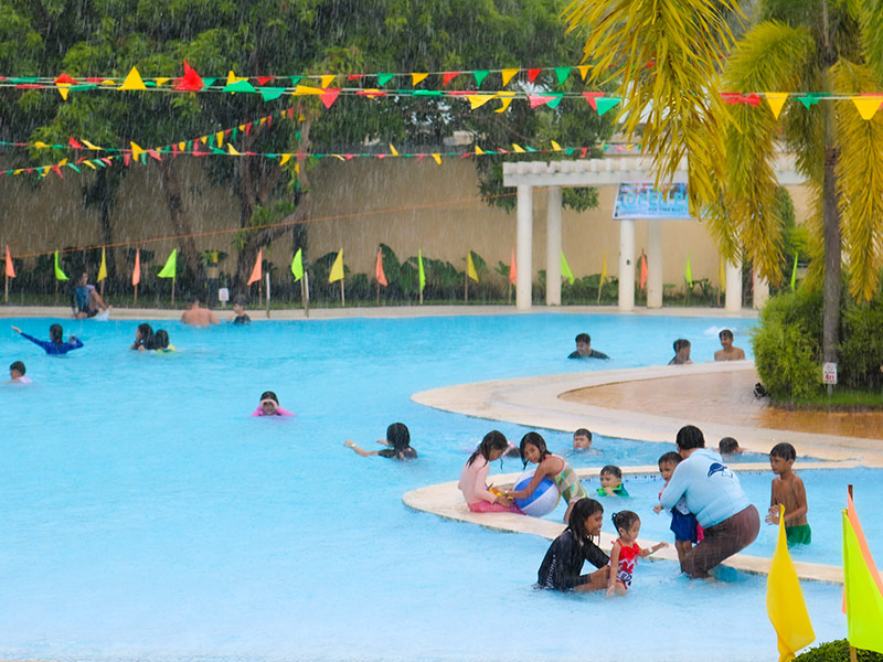 Families and residents enjoy a fun-filled day at the community pool in Parc Regency Residences, Pavia, Iloilo, promoting recreation and togetherness.